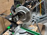 a picture of a mitring saw in a workshop