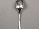 a spoon that is sitting on a table