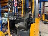 a picture of a forklift in a warehouse