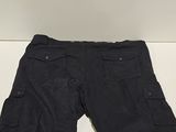 the shorts are black and have buttons on the side