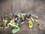 a lot of figurines that are sitting on a table
