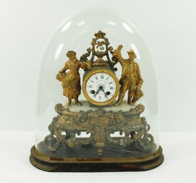a glass dome with a clock inside of it