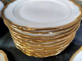 many plates stacked on top of each other on a table