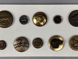 a close up of a white board with a bunch of buttons on it