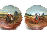 deux assiettes décoratives représentant un agriculteur et une agricultrice