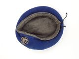 a blue hat with a silver button on top of it