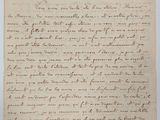 lettre manuscrite écrite à l'encre noire sur une feuille de papier