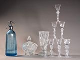 a lot of glass items that are on the table