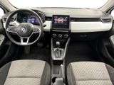 a picture of a car interior with a steering wheel and dashboard