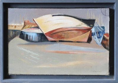 un tableau représentant un bateau posé sur une table