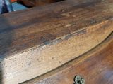 a close up of a piece of wood on a table