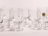 a lot of empty wine glasses on the table
