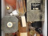 a box with a lot of perfumes inside of it