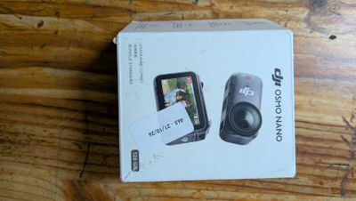 a box that has a camera inside of it on a table