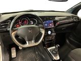 the interior of a car with a steering wheel and dashboard controls