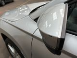 a close up of a car ' s side mirror on the side of the car