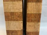 pair of antique leather bound bookends with wooden strips