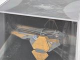 a plastic box with a model of a space ship inside of it