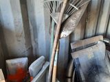 a pile of junk in the corner of a room