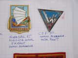 some pins that are on a piece of paper