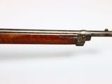 a close up of a rifle on a white background
