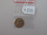 une pièce dans un sachet transparent muni d'une étiquette de prix
