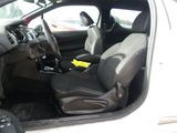 a picture of the inside of a car with the door open