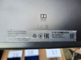 an image of a close up of a laptop with a label on it