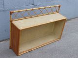a wooden shelf with a shelf on top of it