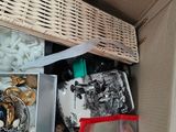 a box full of assorted items in a room