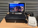 a desktop computer sitting on top of a wooden desk