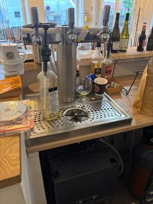 a coffee maker on a counter in a kitchen