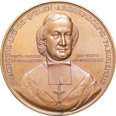 une image représentant une médaille de bronze sur laquelle figure le portrait d'un prêtre