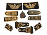 a lot of different types of military uniforms on a white background