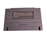 a nintendo game console sitting on top of a white table