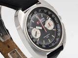 an image of a close up of a wrist watch with a black strap