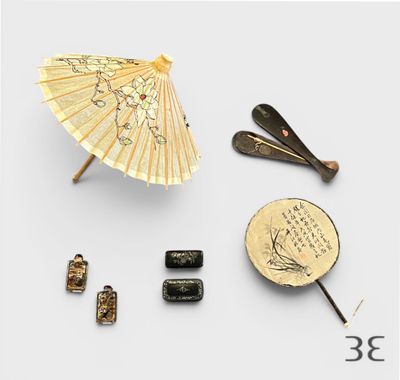 une photo d'un ensemble d'objets comprenant une ombrelle, une broche et une paire de boucles d'oreilles