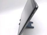 a close up picture of a tablet computer on a stand