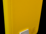 a yellow binder with a white button on it