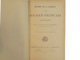 an old book opened to show the title of a novel