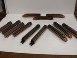 a lot of different types of train tracks on the table