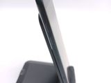 a close up of a cell phone on a stand
