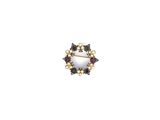 a close up of a brooch with pearls on it