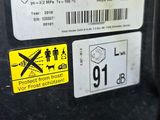 a close up of the back of a car with a sticker on it