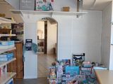 a large room with a lot of toys on the shelves