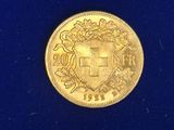 an image of a gold coin with a coat of arms on it