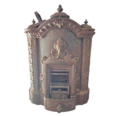 an old wooden stove with a decorative design on it