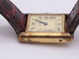 an image of a close up of a watch on a white surface