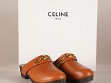 mules en cuir Celine avec chaîne dorée