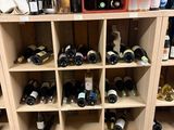 many bottles of wine on the shelves in the room